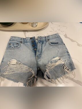 GRLFRND Light Wash Distressed Button-Fly Jean Shorts